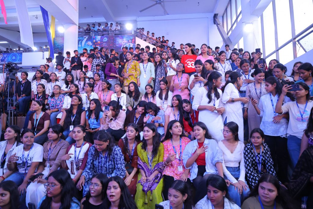 Students and visitors enjoying the live concert at CIMAGE Weekend Fest 2026 with the main stage backdrop
