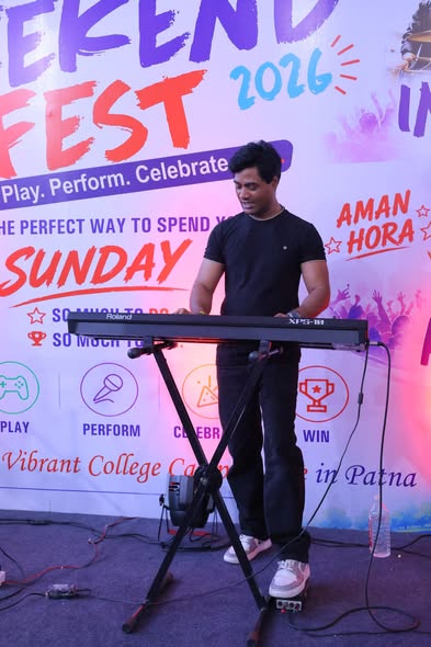 Live stage performance in front of the CIMAGE Weekend Fest 2026 backdrop, Patna