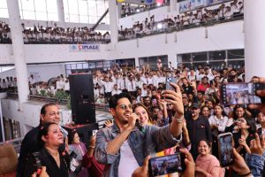 Siddharth Malhotra and Tamannaah Bhatia taking selfie with students at CIMAGE College Patna