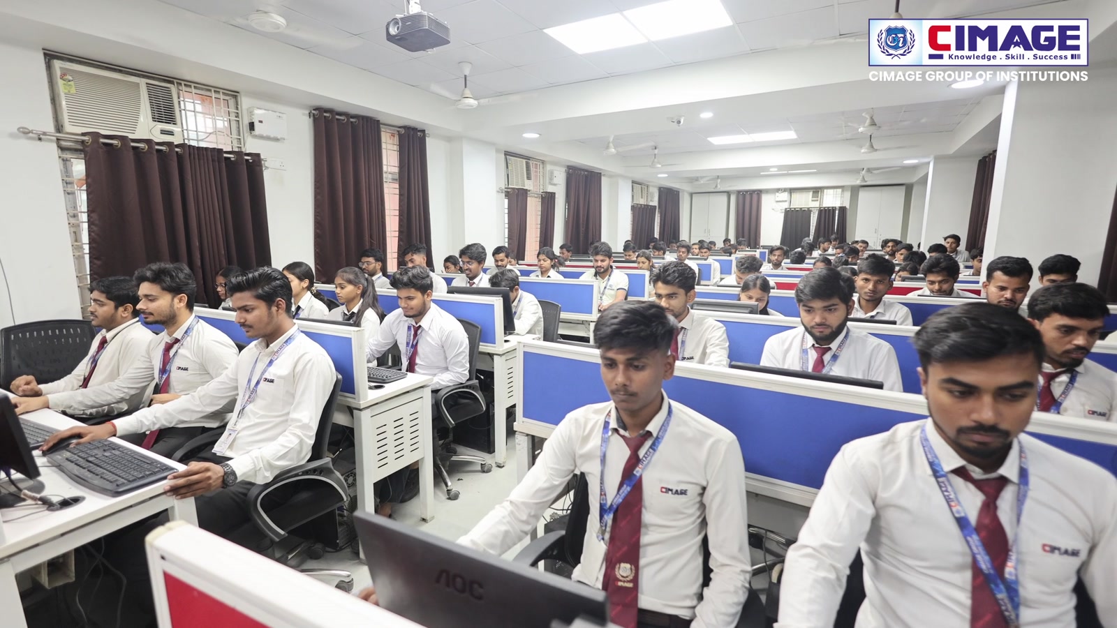 Students working in a computer lab.